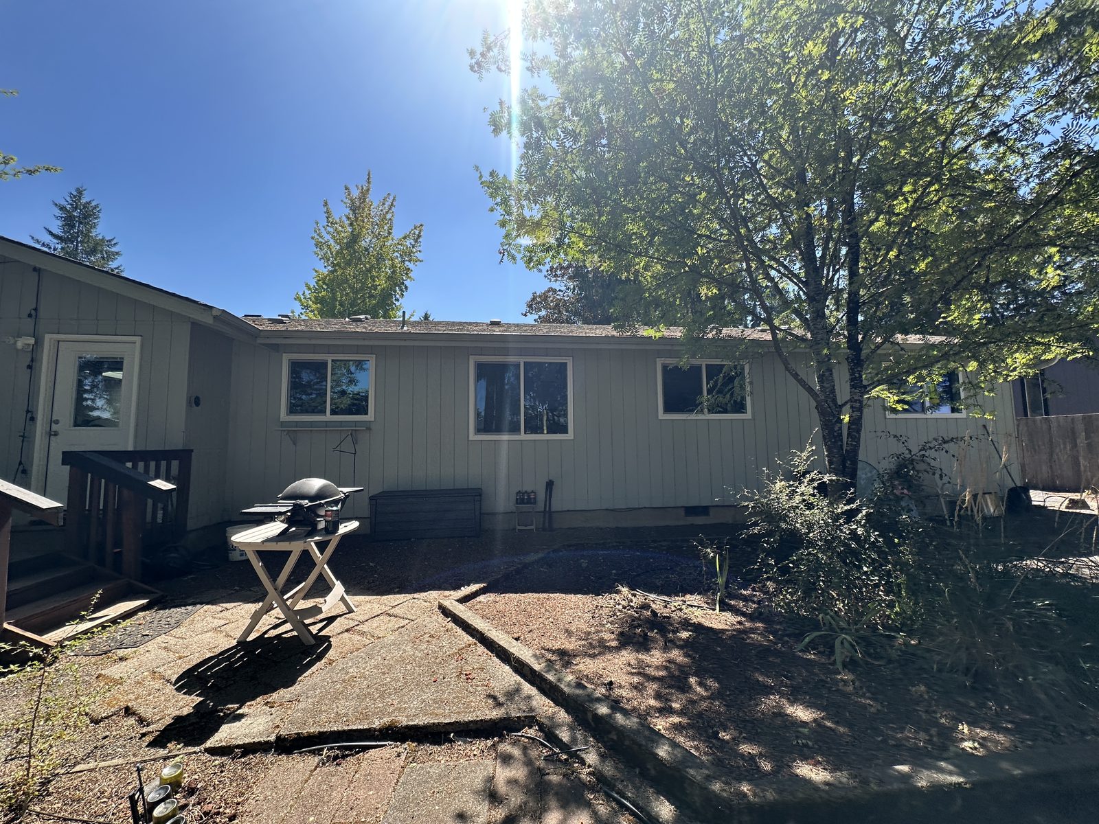 Rear of a single-story house in Eugene where two interior walls are being removed