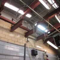 Steel roof framing and masonry walls inside the existing Bartels Packing plant