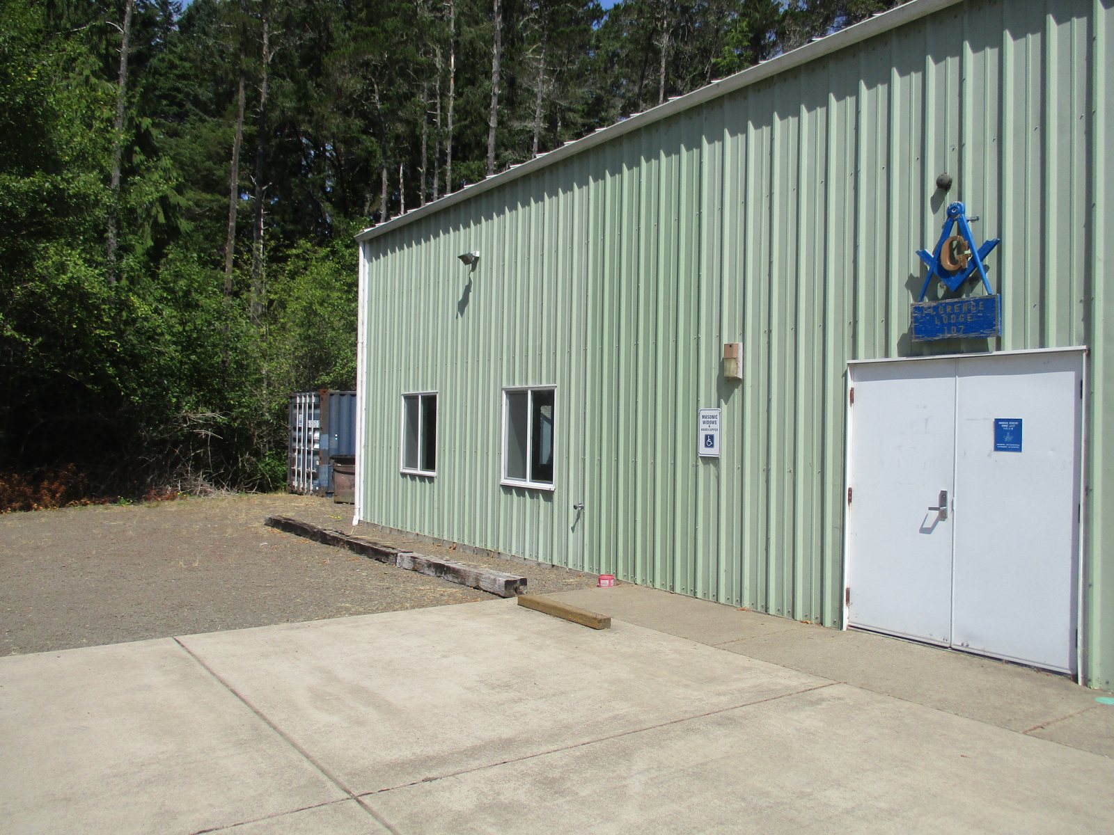 Florence Masonic Lodge building and entry drive where the new porte-cochere was planned, Florence, Oregon