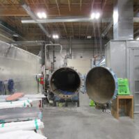 Manufacturing floor with autoclaves inside a light-manufacturing plant in Springfield, Oregon
