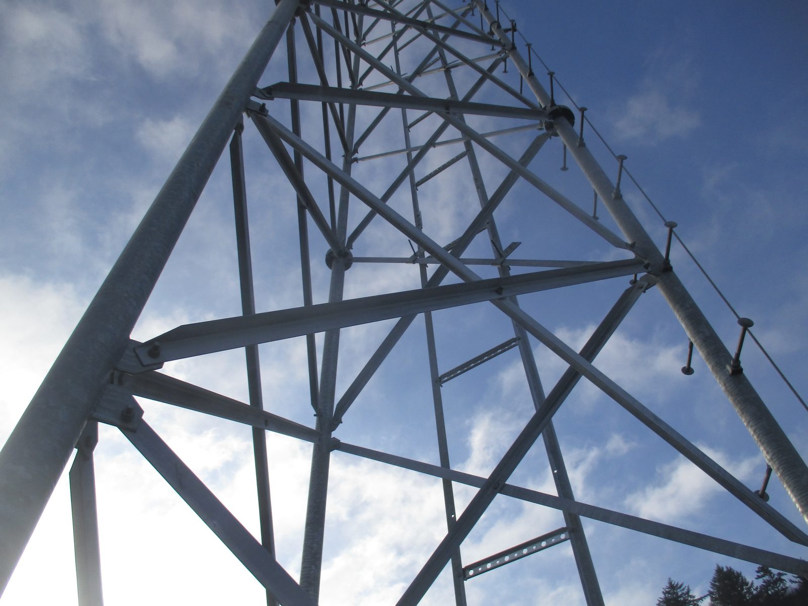 Looking up through a steel lattice communications tower in Portland, Oregon