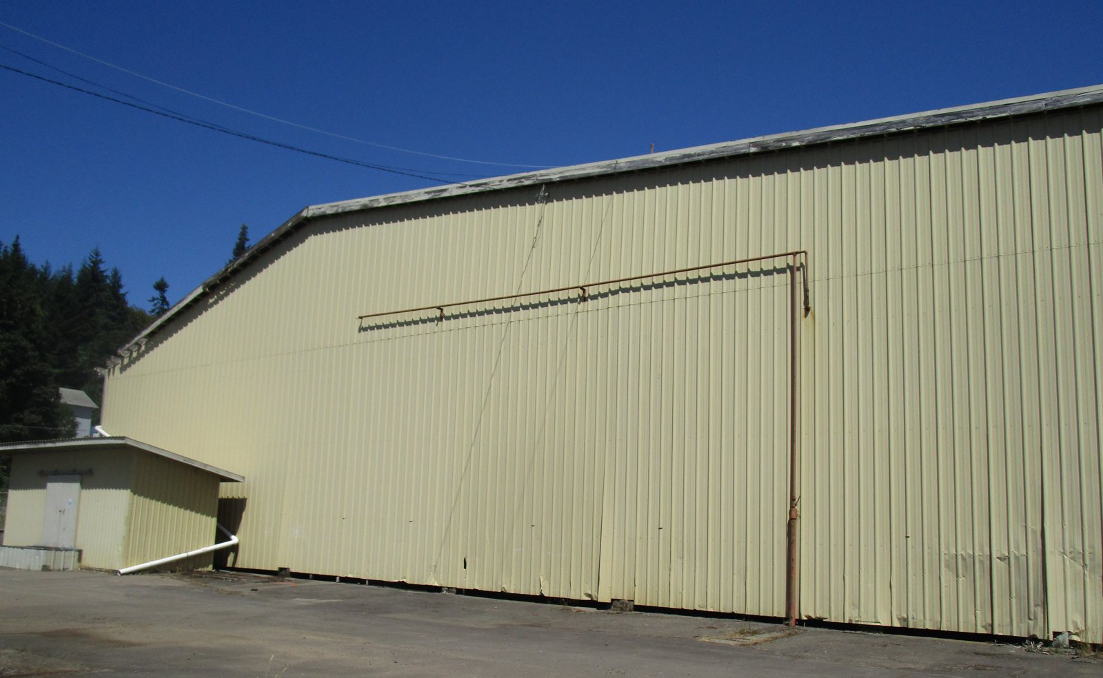 Metal-clad former sawmill building near Cottage Grove, Oregon